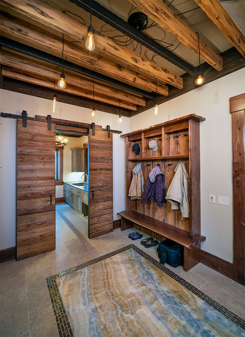 Custom Barn door for laundry complimented by custom ceiling treatment